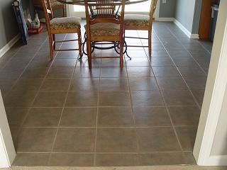 Removal of linoleum and installed underlayment and ceramic tile