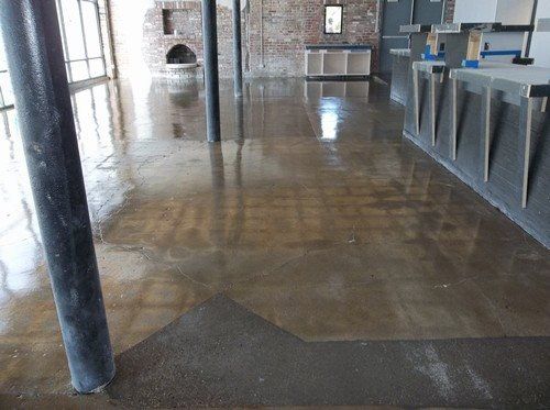 Ground concrete floor with clear epoxy coating