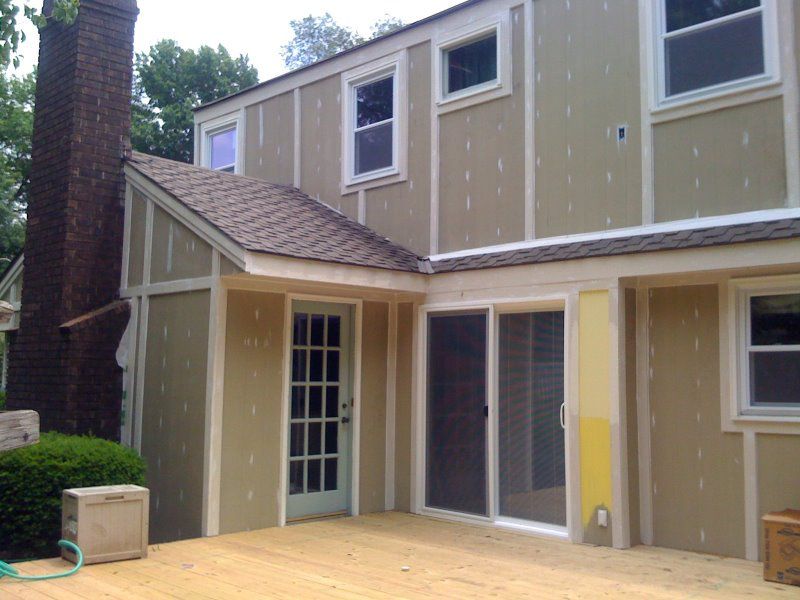 Removal of old siding and install Hardi cement siding with new windows, gutters and trim