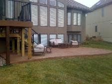 Custom shaped, stamped and acid stained patio extension