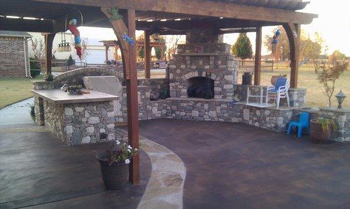 Stained Concrete, Natural Stone Wall, Arbor & Outdoor Kitchen