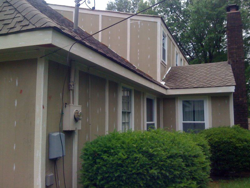 Removal of old siding and install Hardi cement siding with new windows, gutters and trim