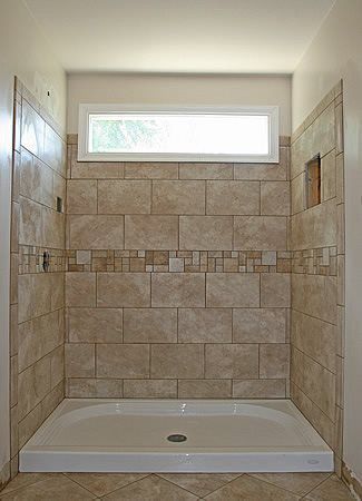 Removed fiberglass unit and installed deco tile