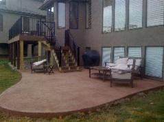 Custom acid stained, stamped patio extension