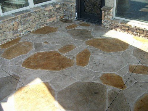 Stamped Concrete - Patio (Sun Buff with custom stain accents)